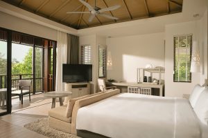 Open-plan living room with warm tones and comfortable seating
